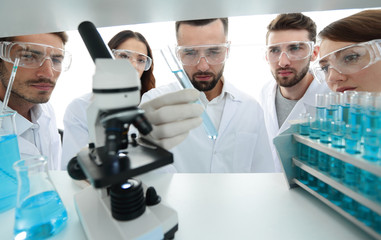 group of pharmacists working in the laboratory.