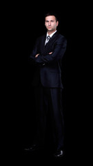 portrait of confident businessman,isolated on a black