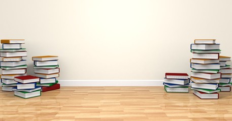 Libros apilados en suelo
