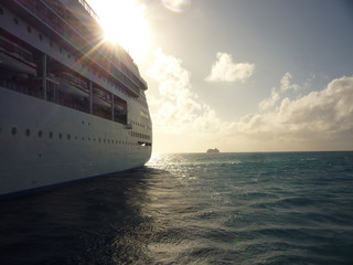 Cruiseships Norwegian Sky NCL and Majesty of the Seas Royal CAribbean anchoring at sea