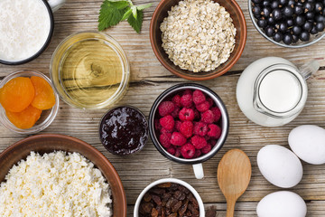 Authentic elements for cooking homemade granola. Summer time. Seasonal food. Healthy breakfast.