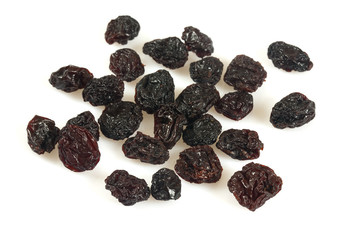 black raisins isolated on white