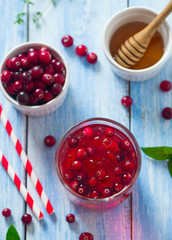 cranberry drink on wooden surface
