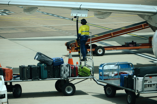 holiday luggage going onto aircraft