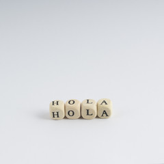 formation of the word Hola with nuts containing the letters © Sergio Delle Vedove