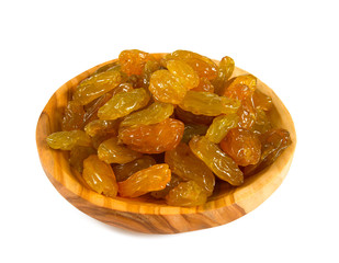 yellow jumbo size raisins isolated on white