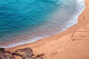 Wave on the sand beach background