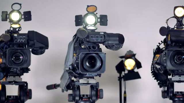 Professional video cameras with professional external microphones. 