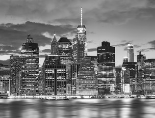 Fototapeta na wymiar Black and white picture of New York City skyline at night, USA.
