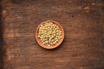 close up of lentils bean in wooden bowl 