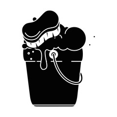 bucket with foam and brush