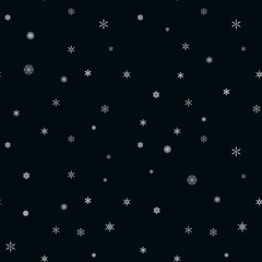 A variety of snowflakes, light snowflakes of different forms on a dark background. Seamless vector pattern.