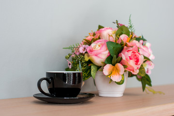 Obraz na płótnie Canvas Coffee Break, coffee mug and flower pot