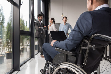 disabled businessman with laptop