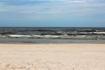 Fototapeta na wymiar Perfect deserted white sand beach with the Baltic sea. tricolor
