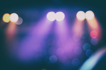 bokeh wallpaper. Disfocus or Blurred background of the stage lighting in vintage color. background for business - concert concept. © PRASERT