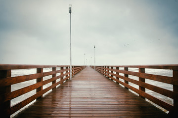 Fototapeta na wymiar Long wooden pier