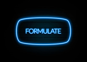 Formulate  - colorful Neon Sign on brickwall