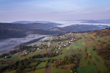 Beautiful foggy morning in mountains.