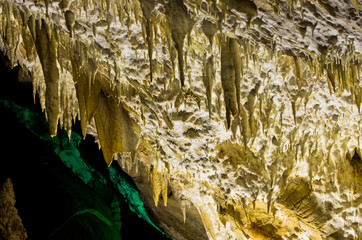 Detail of illuminated cave ceiling with a lot of amazing natural decorations, Homolje mountains, east Serbia