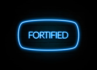 Fortified  - colorful Neon Sign on brickwall