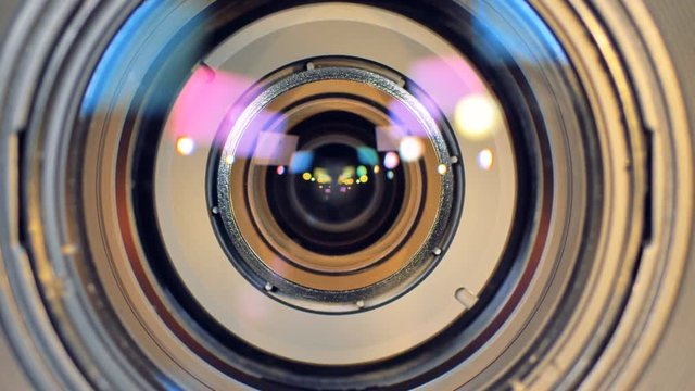 A shot moving and stopping at a camera lens macro. 