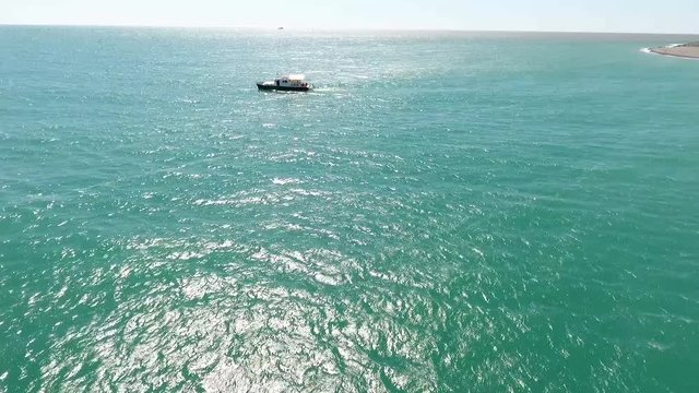 Boat at sea with quadrocopter