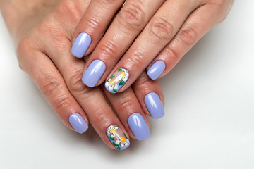 purple, lilac manicure with painted daisies on short square nails
