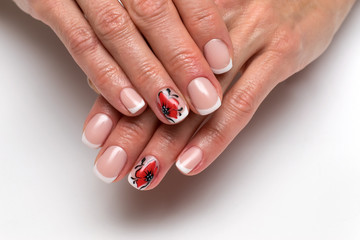 French manicure with painted poppies on short square nails
