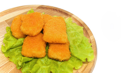Delicious food , fried chicken nuggets with cheese in breaking on the wooden board  on isolated white background 