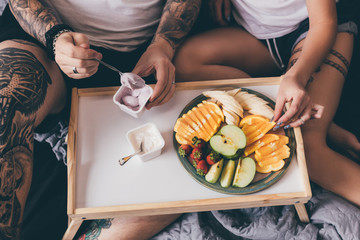 Obraz na płótnie Canvas couple having breakfast together