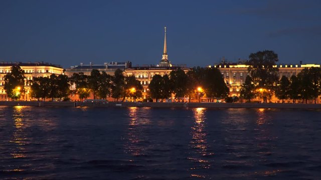 Illuminated buildings on the Neva embankment at night St. Petersburg