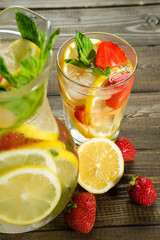 Lemonade with lemon and strawberry, mint and ice
