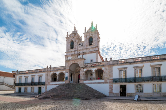 The view of Nossa Senhora da Nazare Church on the central square of small town Nazare. Portugal