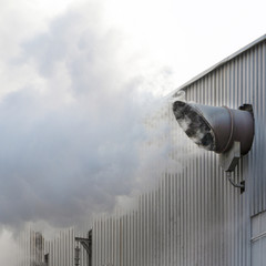 Steaming pipe - technological exhaust. Closeup.