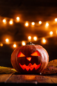 Photo of halloween pumpkin cut in shape of face