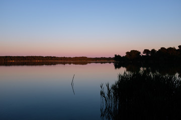Fototapeta na wymiar Sunset over Alimini lake near Otranto. Apulia