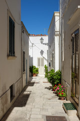 Alley of Castro village in a summer day. Salento, Italy