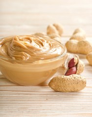 peanuts butter on a wooden background