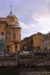 Fototapeta na wymiar Houses on the Griboyedov Canal in St. Petersburg
