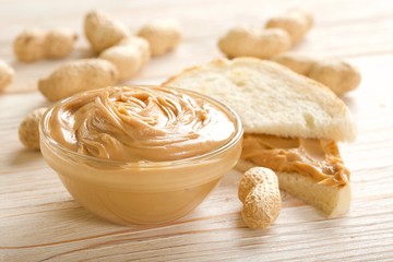 peanuts butter on a wooden background