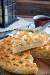 Cut into homemade cabbage cake with egg, selective focus