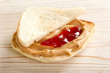 sandwich with peanuts butter and jam