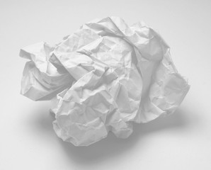 Crumbled paper over white background