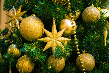 Christmas decorations on the branches of fir tree