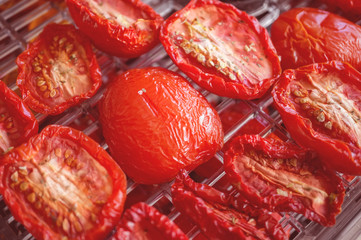 Red ripe tomatoes half prepared for drying. Selective focus. Close-up. Out of focus