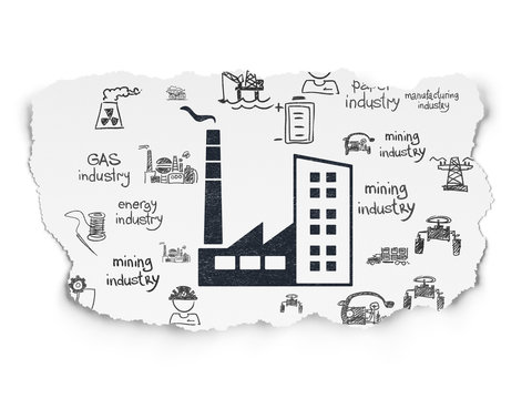 Manufacuring concept: Industry Building on Torn Paper background
