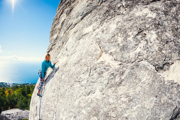 A rock climber on a wall.