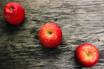 Apples on the wooden table