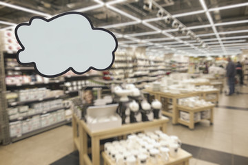 Dishes shop. Defocused image. Place for your text or advertisement.